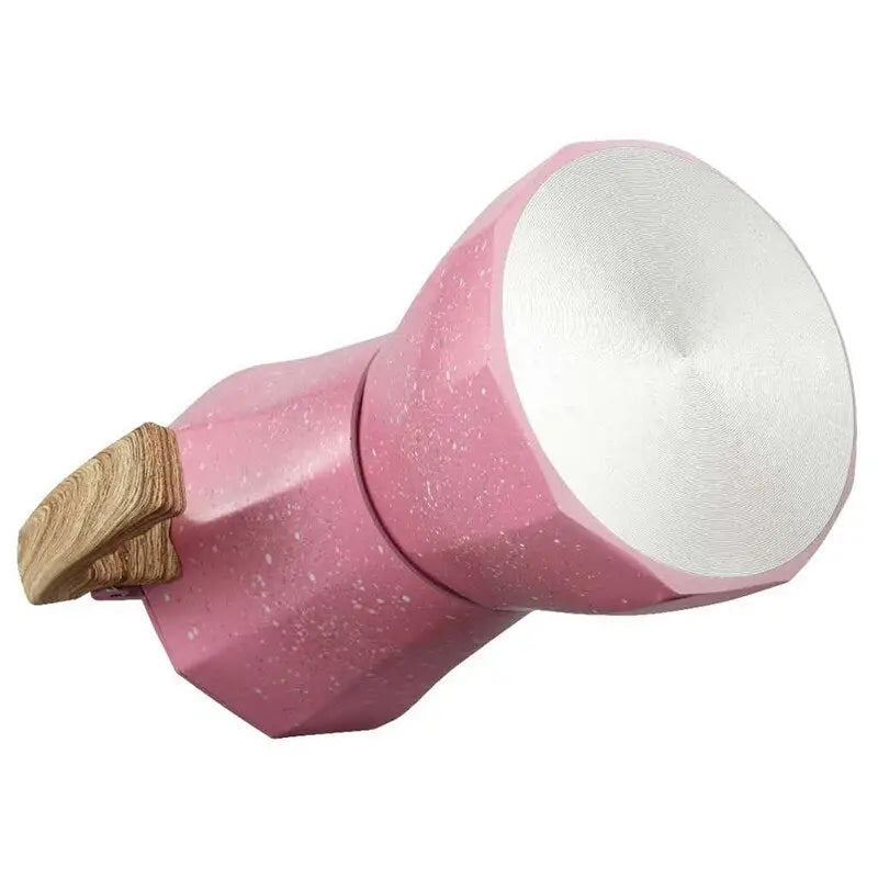 there is a pink object with a wooden handle on a white background