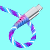 a usb cable with a glowing blue and purple glow