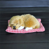 a stuffed teddy bear is laying on a red and white checkered blanket