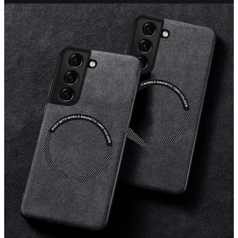 two iphone cases with a black and white pattern