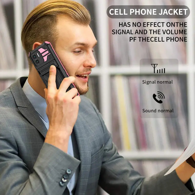 a man in a suit talking on a cell phone
