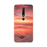 a sunset on the beach phone case