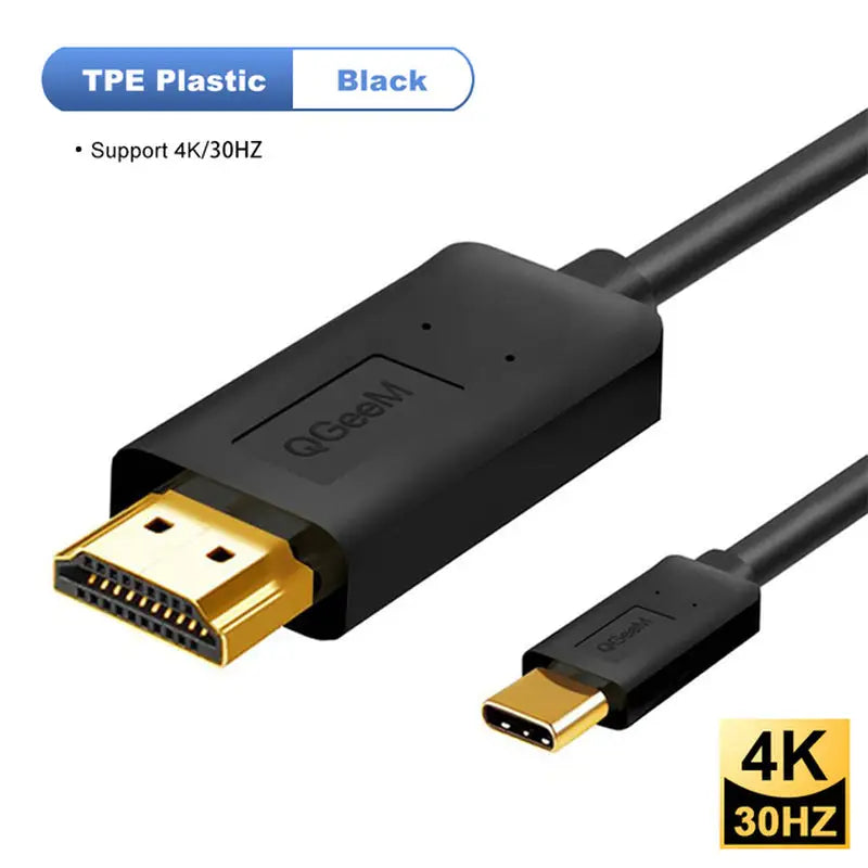 a close up of a black usb cable with a gold connector