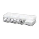 a white plastic box with four white plastic rings