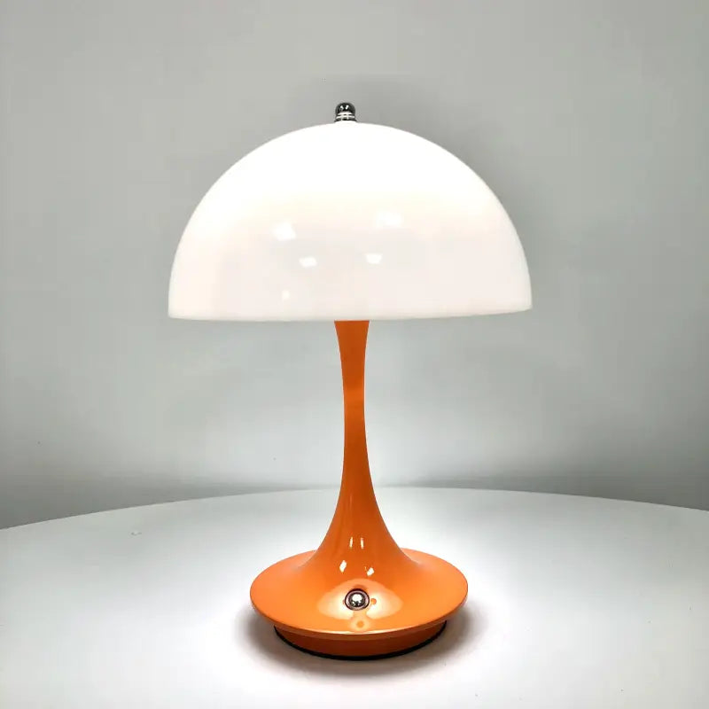 a table lamp with a white shade on it