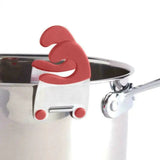 a red heart is stuck into a pot
