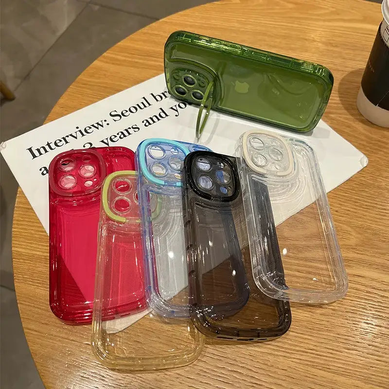 a table with three cell cases on it