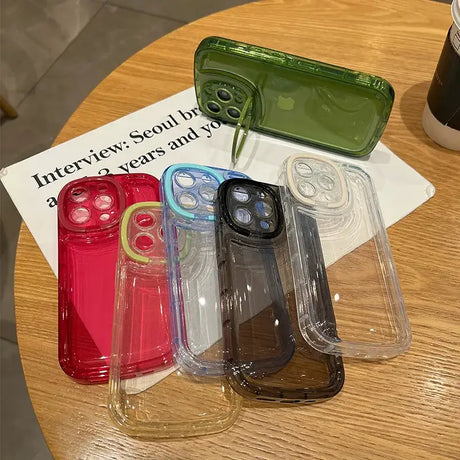 A table with three cell cases on it