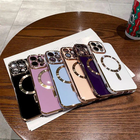 a table with three iphones on it
