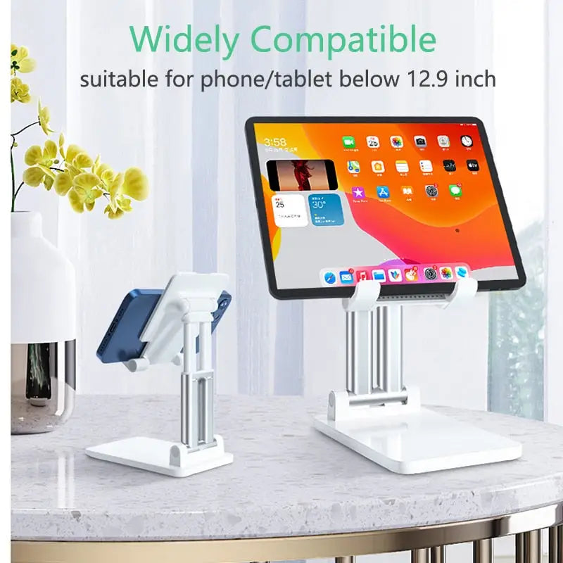 the ipad stand is on a table with a tablet