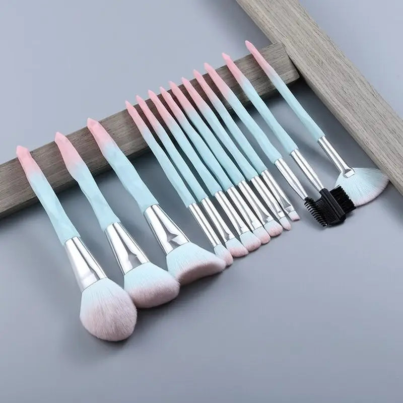 a set of makeup brushes and brushes on a table