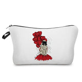 a white cosmetic bag with a red flower on it