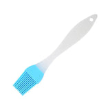 a blue brush with a white handle