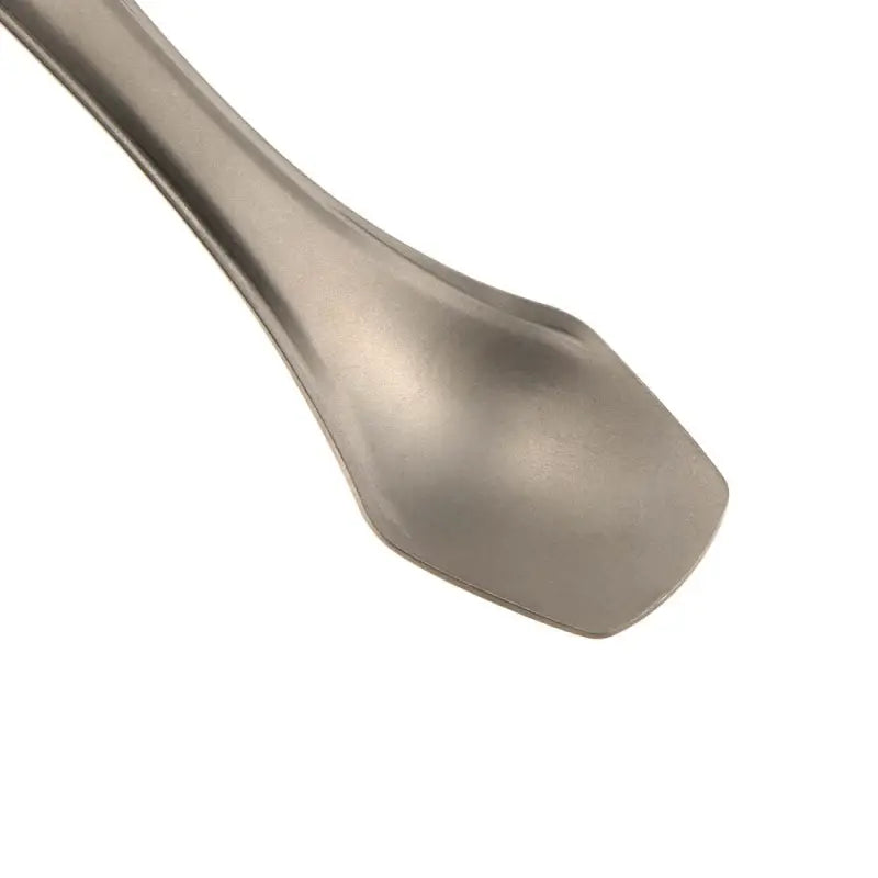 a spoon with a handle on a white background