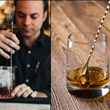 a man pouring whiskey into a glass