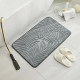 a bath mat with a towel and slip on it