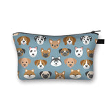 a blue zipper bag with a pattern of dogs