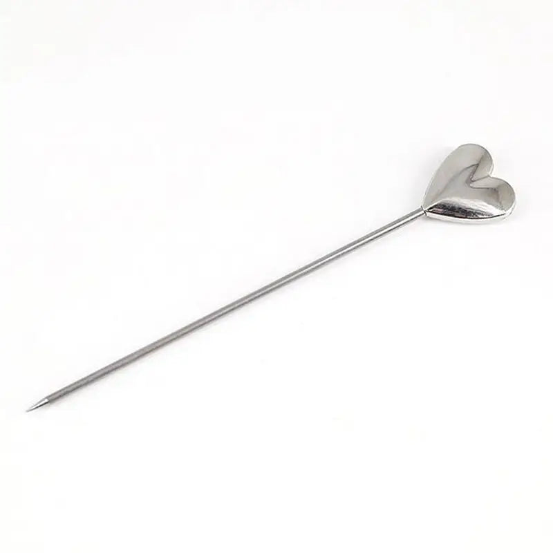 a metal spoon with a metal handle on a white background
