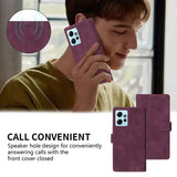the back of a purple leather case with a boy talking on a cell