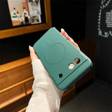 Teal-colored smartphone case with a simple embossed design.