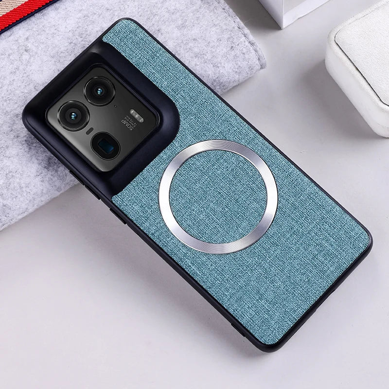 Teal fabric phone case with a magnetic ring.