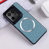 Teal fabric phone case with a magnetic ring.