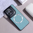 A teal fabric-textured phone case with a black camera module and a silver magnetic ring.