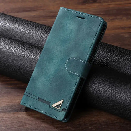 Teal leather wallet-style phone case with a metallic triangle accent.