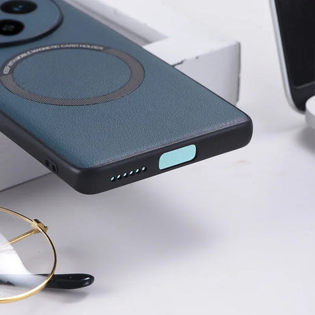 Teal smartphone case with a circular camera cutout and a light blue button on the side.