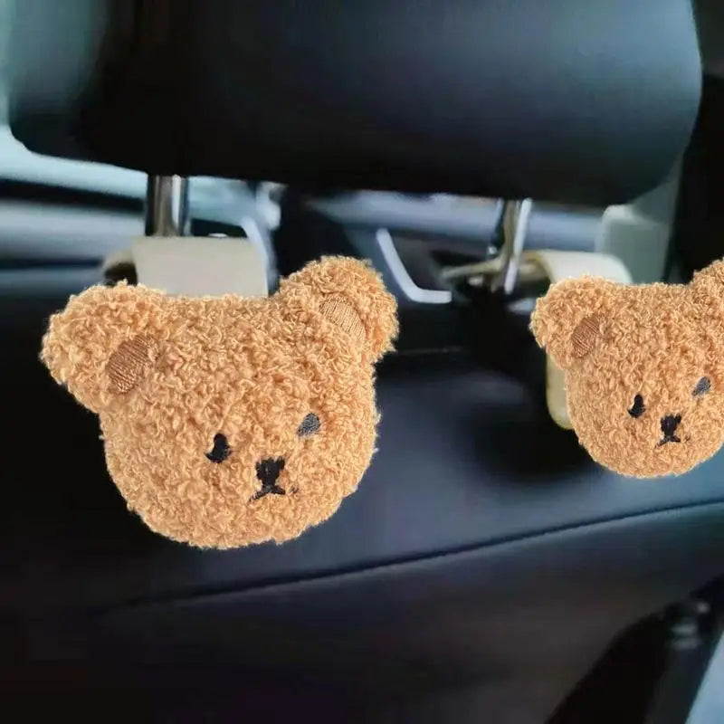 a teddy bear shaped car seat clip