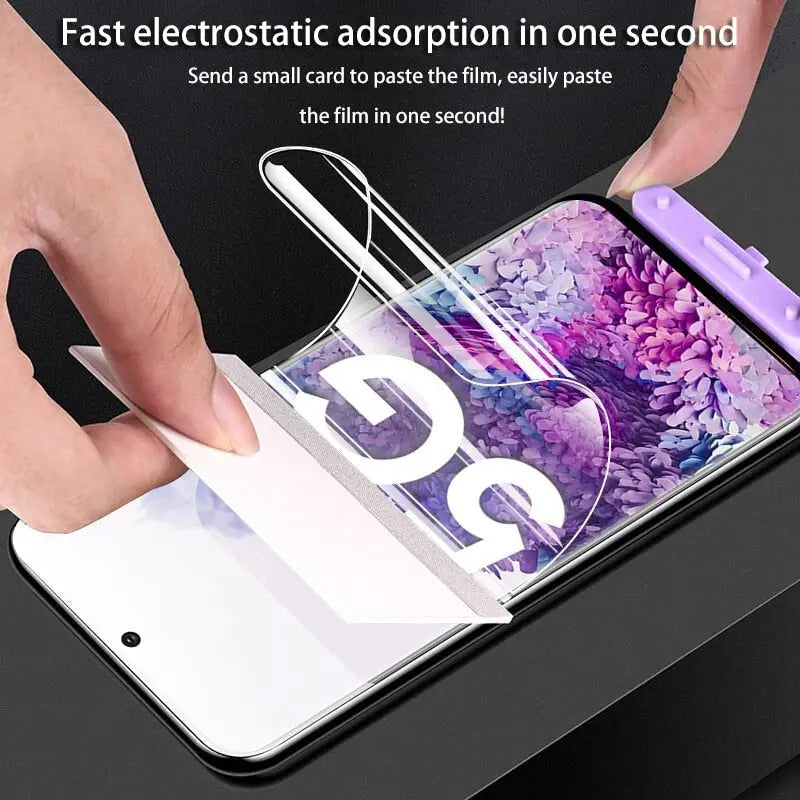 a hand holding a pen over a phone