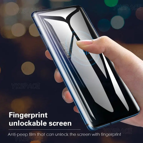 a hand holding a phone with a screen protector