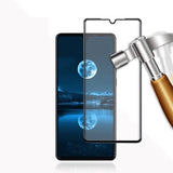 a hammer hammers a smartphone with a glass screen