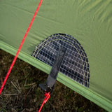 the tent is attached to the ground