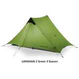 the tent is green and has a black and white logo