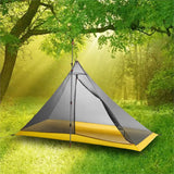 a tent in the woods