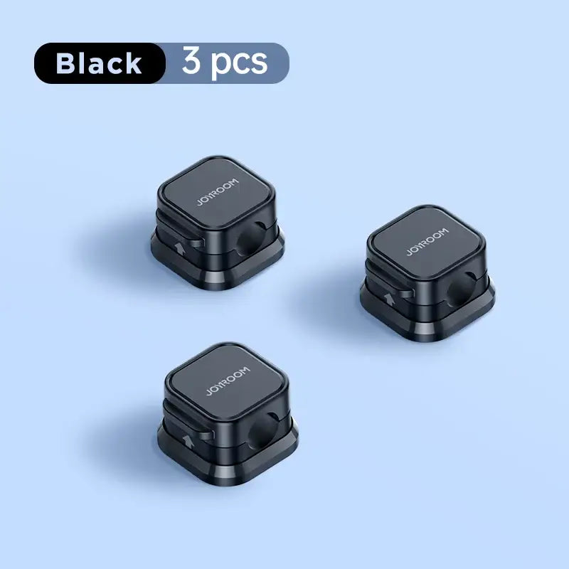 Three black earphones on a blue background