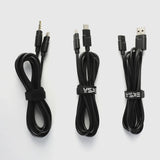 Three black electronic cables bundled with cable ties.