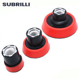 three red and black rubber wheels with a nut on top