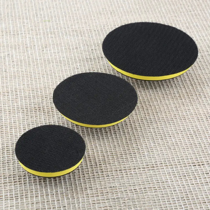 two black and yellow circles with a white background