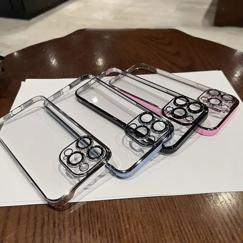 three clear cases on a table