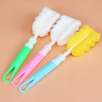 three colorful plastic toothbrushs with a toothbrush