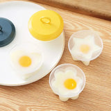three eggs in a white plate with a blue egg in the middle
