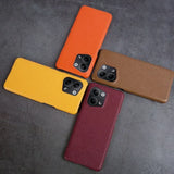 three iphone cases with a camera on them