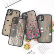 three iphone cases with flowers and leaves