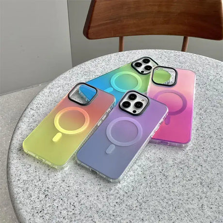 Three iphone cases sitting on a table