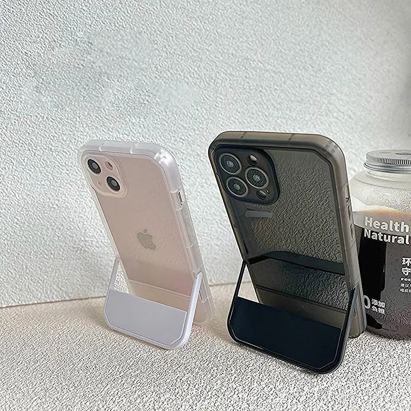 three different iphone cases sitting on a table