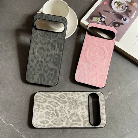 Three leopard-print phone cases with built-in camera cutouts and circular magnetic charging areas.
