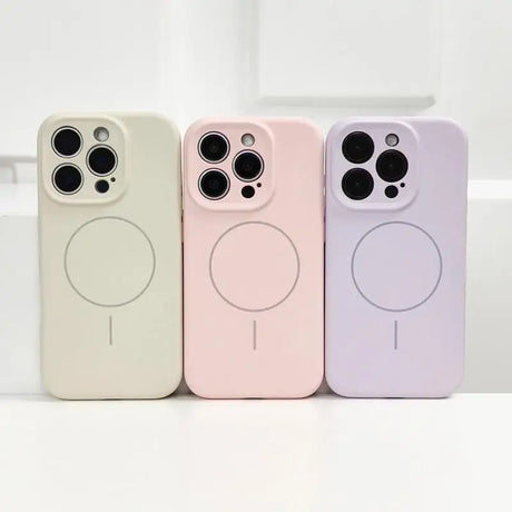 Three pastel-colored silicone phone cases with camera cutouts and MagSafe rings.