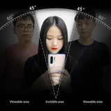 there are three people standing in a circle with a cell phone